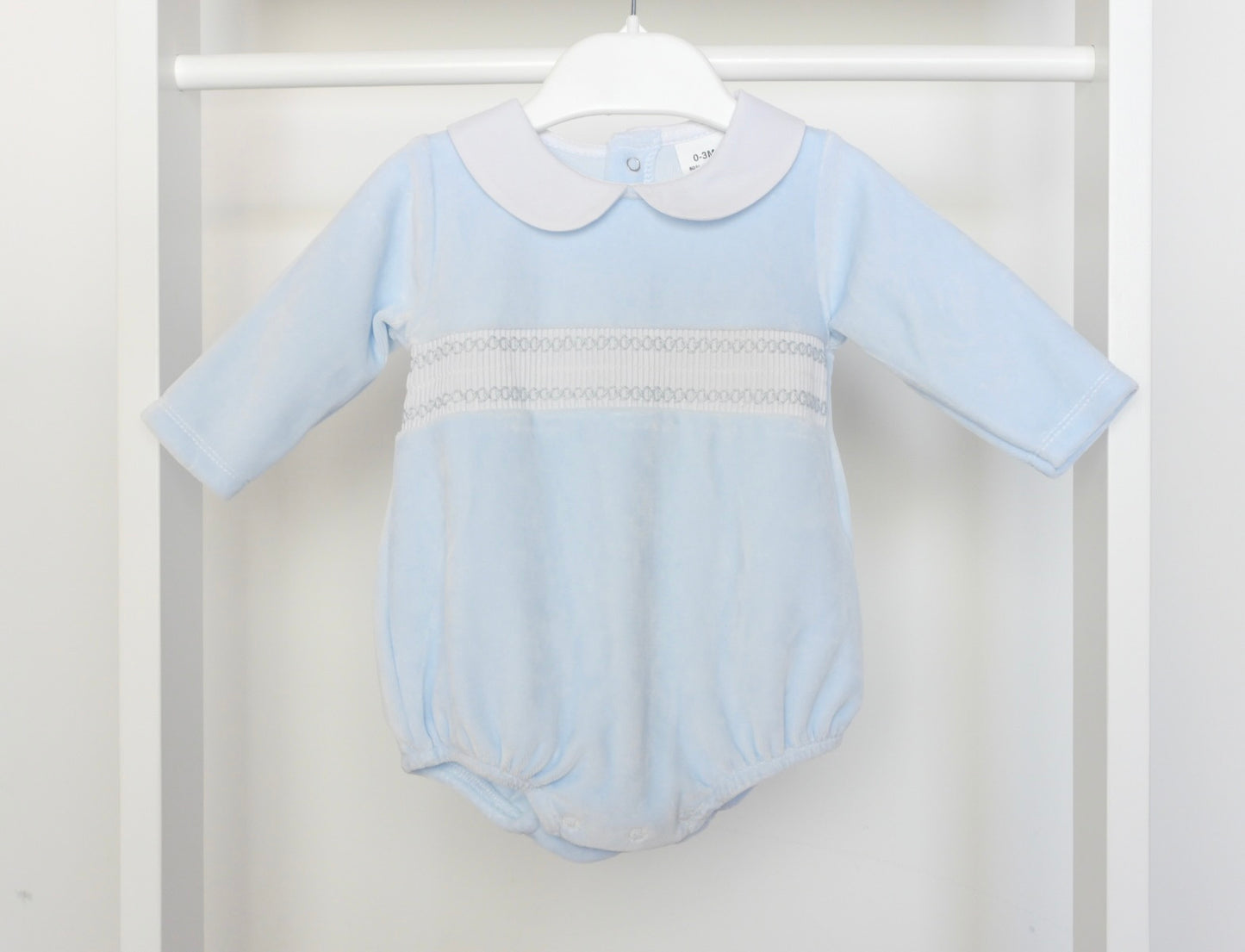 BABY BLUE SMOCKED LONG SLEEVE ROMPER