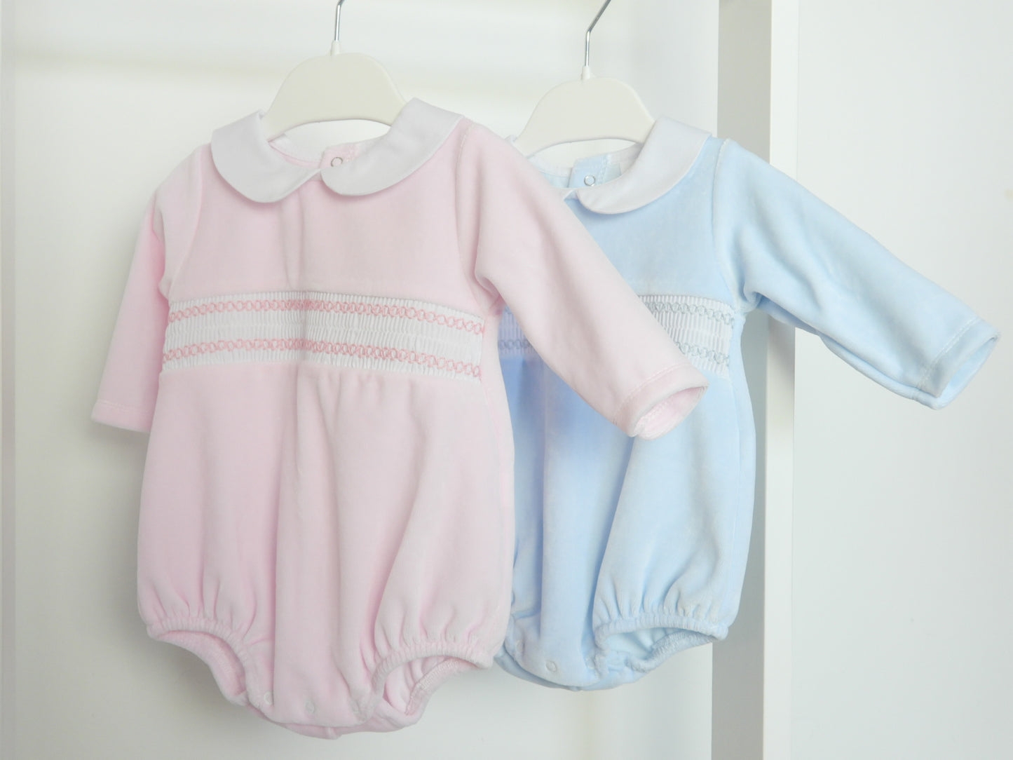 BABY BLUE SMOCKED LONG SLEEVE ROMPER