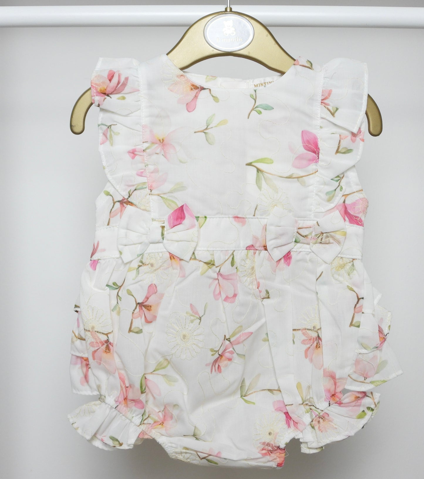 PINK FLORAL ROMPER BY MINTINI