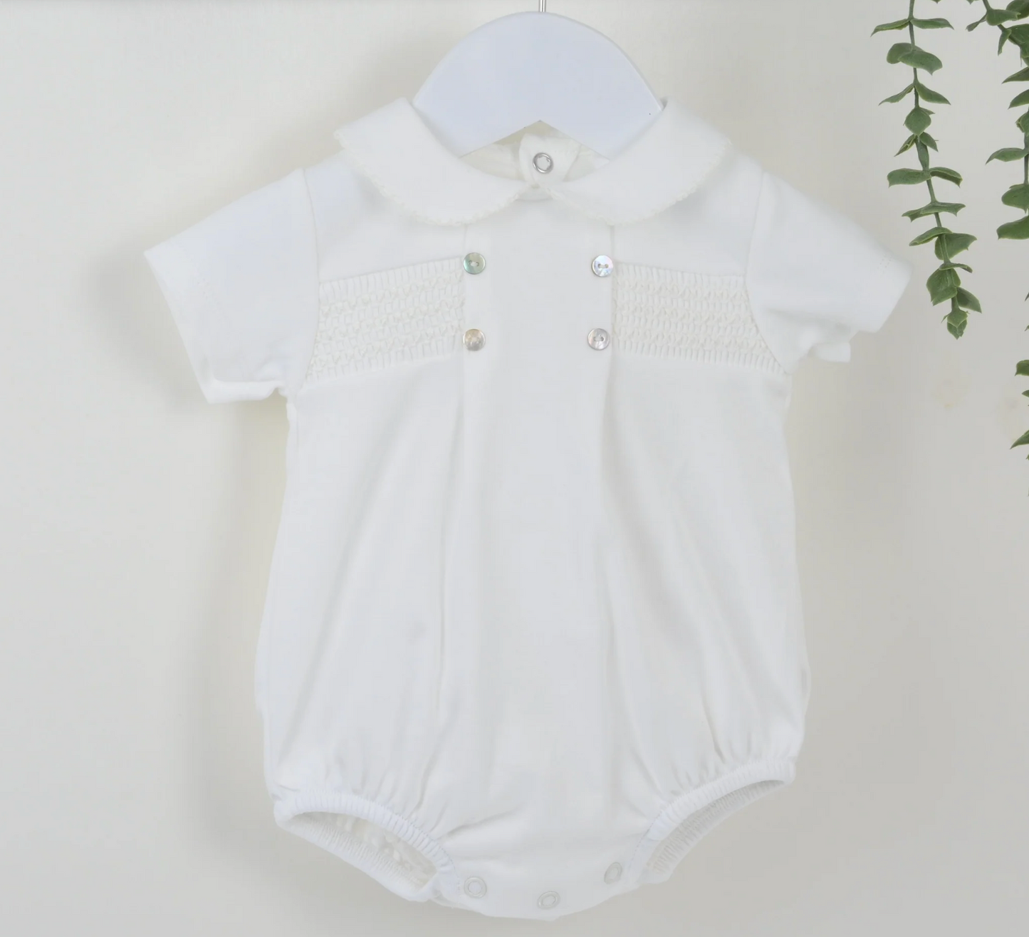 IVORY SMOCKED ROMPER